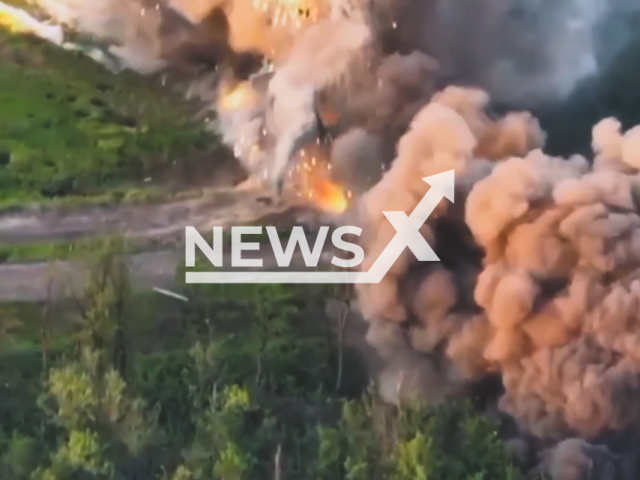 Ukrainian fighters destroy Russian ammunition field storage in big explosion in Ukraine in undated footage. The footage was released by 53rd separate mechanized brigade on Wednesday, May, 24, 2023.
 Note: Picture is a screenshot from a video (@53brigade/Newsflash)