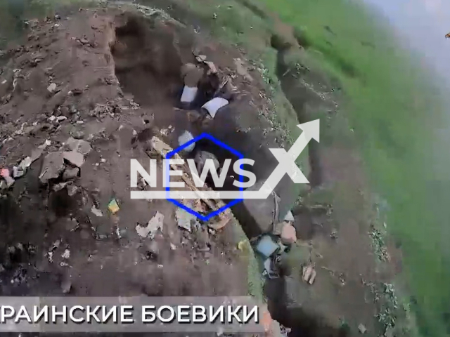 DPR kamikaze drone destroy Ukrainian military position near Avdiivka in Ukraine in undated footage. The footage was released by People's Militia of the DPR on Friday, May, 26, 2023.
Note: Picture is a screenshot from a video (@nm_dnr/Newsflash)