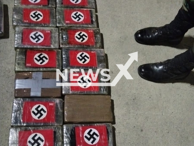 Photo shows the packages of cocaine bearing a picture of a Nazi flag on the outside and the name Hitler printed in low relief seized by the Peruvian anti-drug police in the port of Paita, on Peru’s northern Pacific coast, Wednesday, May 24, 2023. The drugs were hidden inside a shipping container carrying asparagus on the Liberian-flagged vessel SC Anisha R that had earlier anchored in the Ecuadorian port of Ecuador. Note: Police photo (@PoliciaPeru/Newsflash)