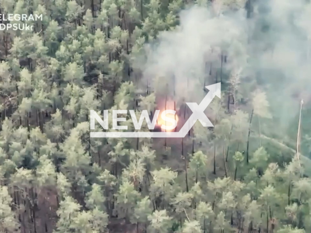 Ukrainian border guards destroy camouflaged Russian camouflaged military formation in the Lyman direction in Donetsk region in Ukraine in undated footage. The footage was released by State Border Service of Ukraine on Monday, May, 29, 2023.
Notes: Photo is screen from a video (@DPSUkr/Newsflash)