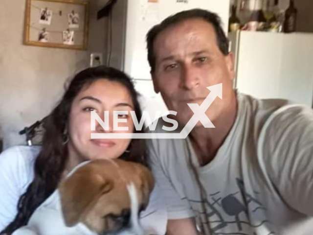 David Marcelo Arancibia Gutiérrez, 53, poses with his daughter Rocio in undated photo. He was stabbed to death in Santa Fe, Argentina. Note: Private photo. (Rocio Arancibia/Newsflash)