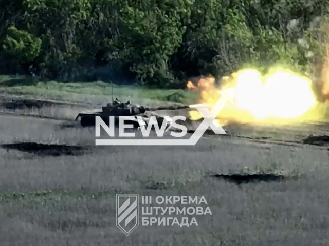 Ukrainian tank hits the Russian military positions near Bakhmut in Ukraine in undated footage. The footage was released by 3rd separate assault brigade on Tuesday, May, 30, 2023.
Notes: Photo is screen from a video. (@ab3army/Newsflash)